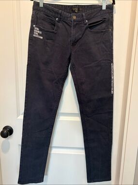 Women's dark Skinny Jeans with White Text Accent